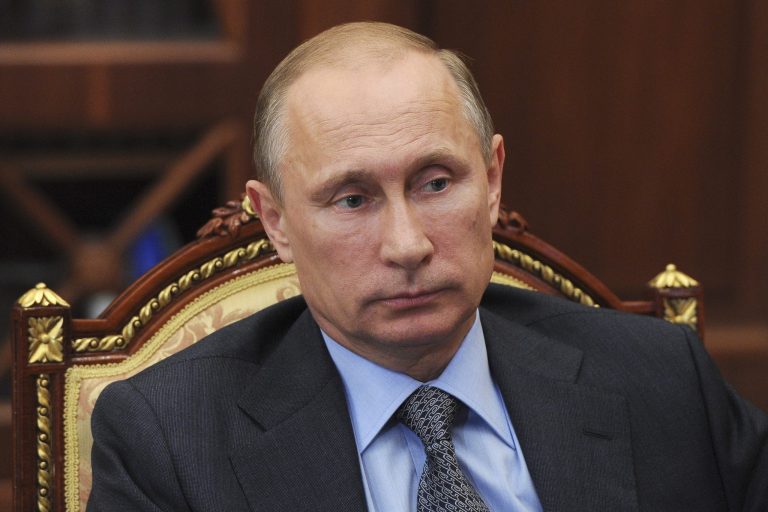 Russian President Vladimir Putin meets with Head of the Jewish autonomous region Alexander Vinnikov in the Kremlin in Moscow, Friday, July 25, 2014. (AP Photo/RIA-Novosti, Mikhail Klimentyev, Presidential Press Service)