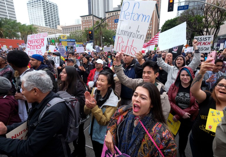 Mayors in Los Angeles, Providence, Anaheim, Orlando, Seattle and Denver participated in the day of action. (AP Photo/Ringo H.W. Chiu)