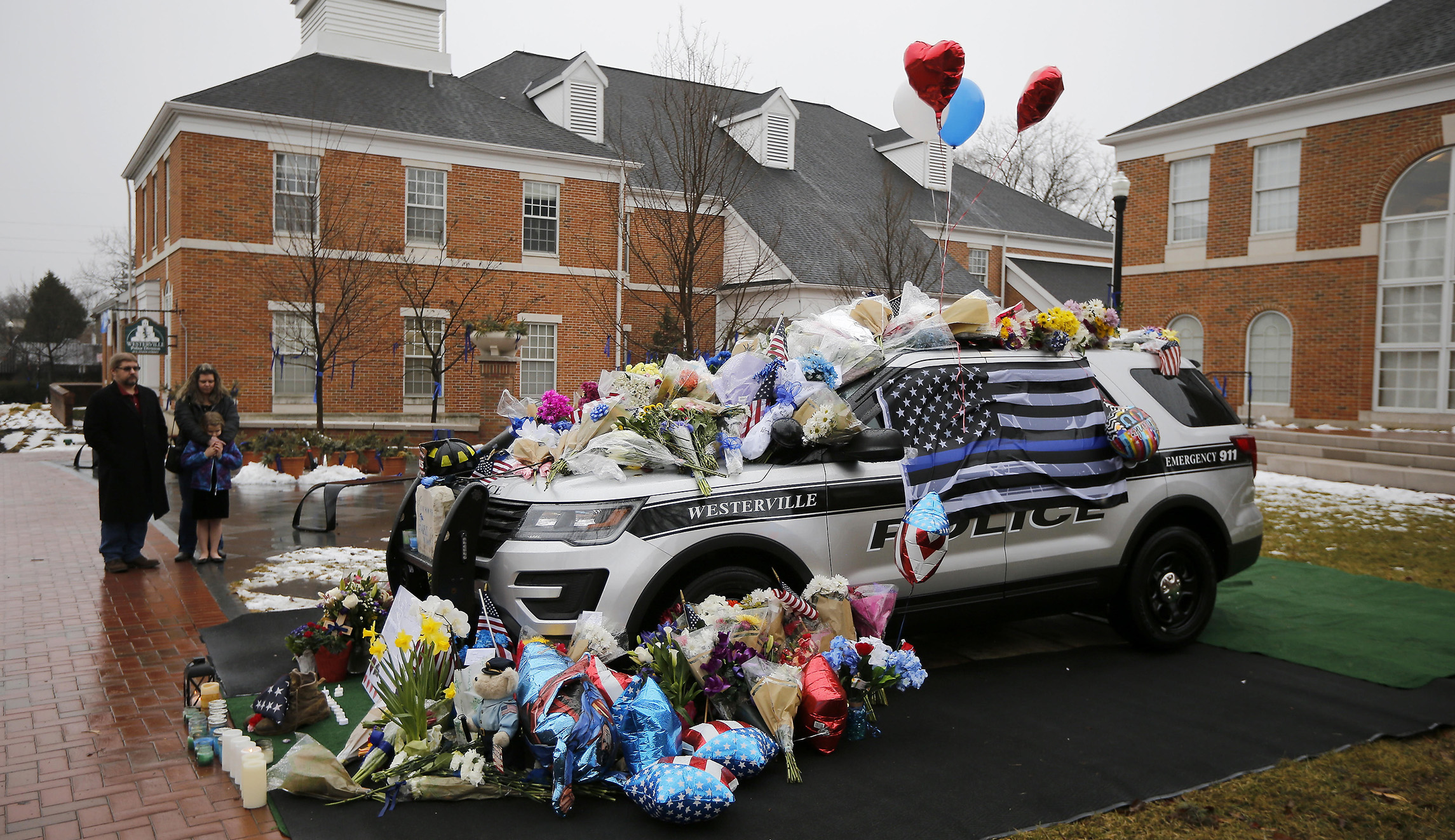 Ohio man charged with buying gun for suspected cop killer