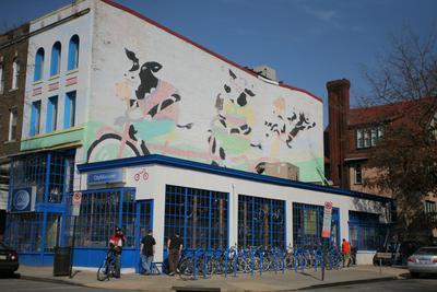 Photo of businesses across Champlain St., NW from Unity Park in Adams Morgan, DC. Problems began at Unity Park with complaints about people illegally selling food. Matthew A. Roth/Examiner File
