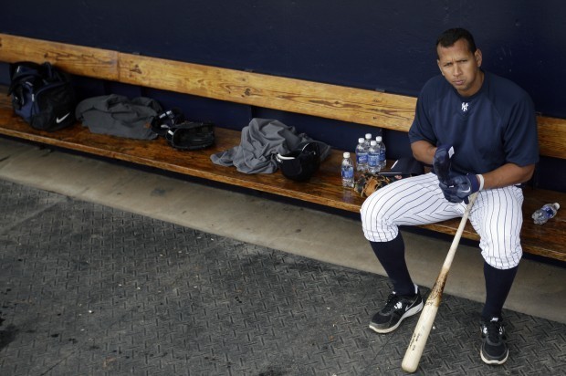 FILE - In this Feb. 25, 2012, file photo, New York Yankees' Alex Rodriguez sits in the dugout during practice at baseball spring training in Tampa, Fla., last February. AP Photo/Matt Slocum