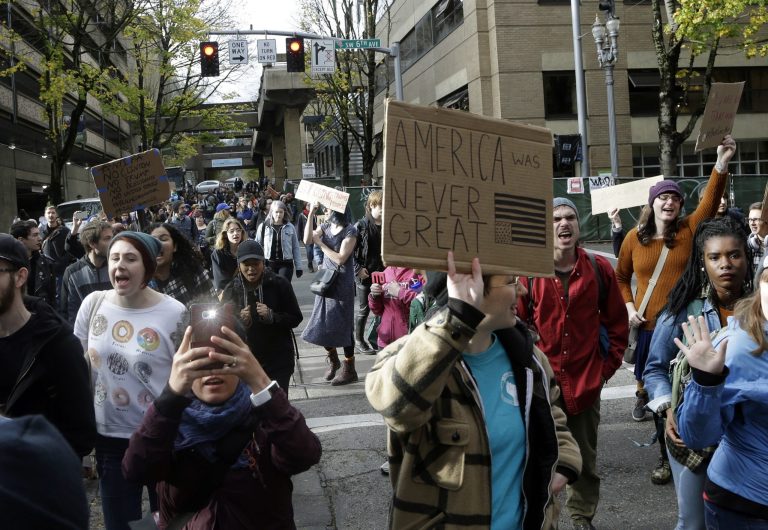 More than 300 students are planning to meet January 19 at Pioneer Courthouse Square in Portland, Ore. to protest President Trump’s appointment of Betsy DeVos as Secretary of Education. (AP Photo/Don Ryan)