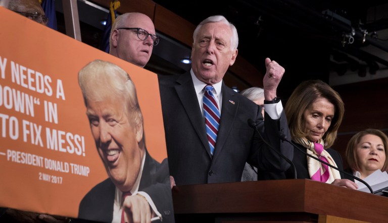 House Minority Whip Steny Hoyer, D-Md., center, told reporters Tuesday that even though government funding will expire after Feb. 8 — right in the middle of the Democratic retreat — they will still leave the Capitol and head to the shore for their annual gathering. (AP Photo/J. Scott Applewhite)