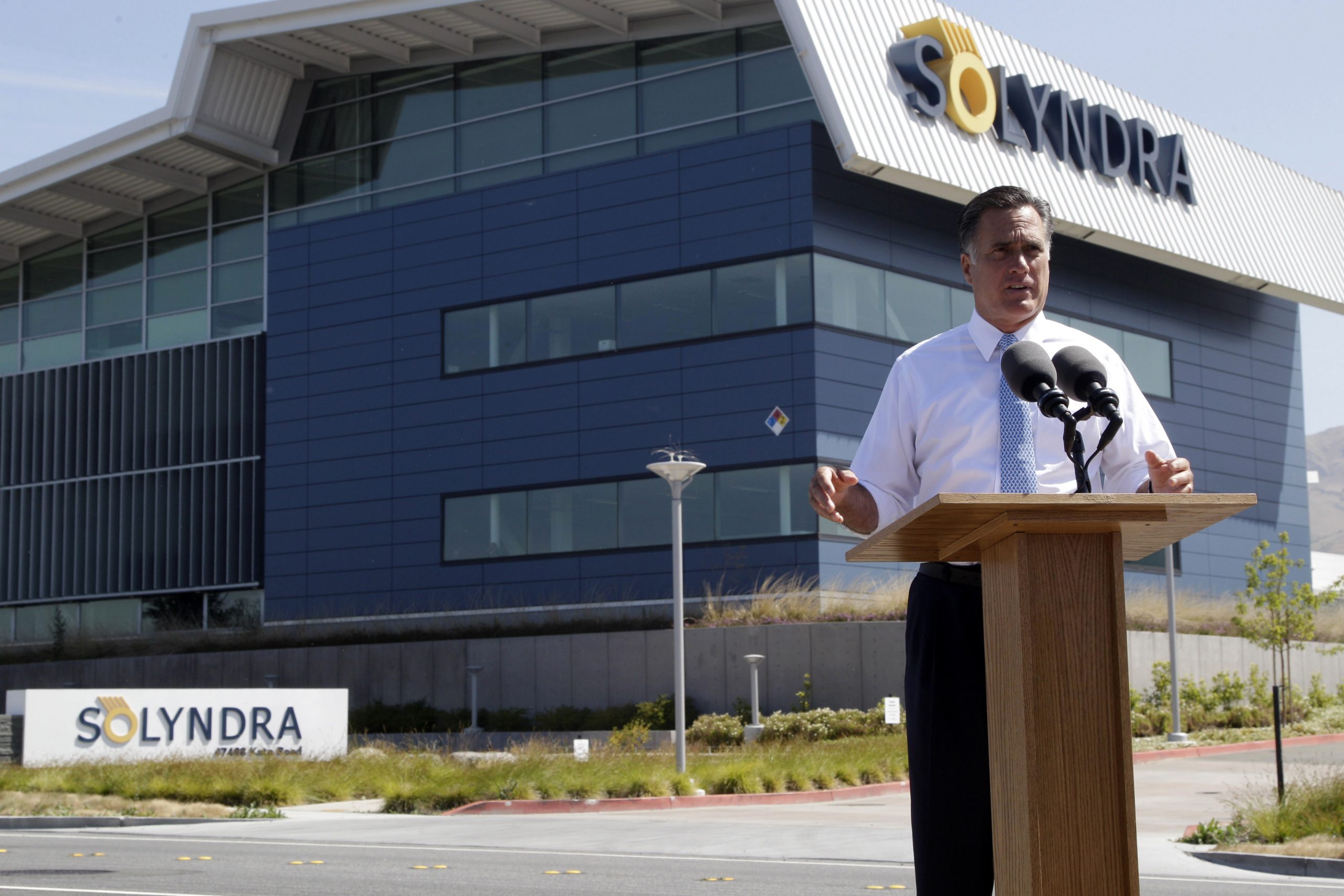 Combative Romney team hits Obama coast-to-coast