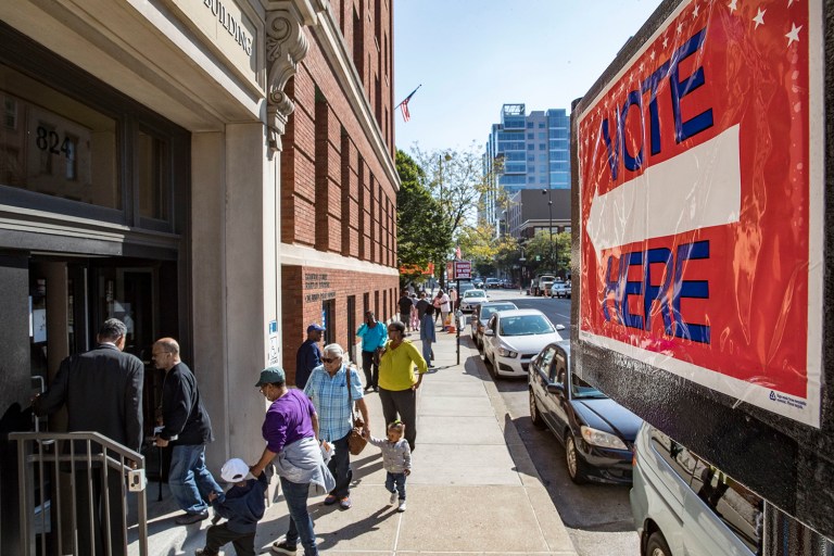 The Justice Department will send out fewer election observers this year due to the Supreme Court's 2013 gutting of the Voting Rights Act. (AP Photo/John Minchillo)