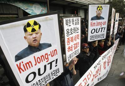 South Korean protesters shout slogans during a rally against possible nuclear test by North Korea in Seoul, South Korea in January. The Korean letters read 