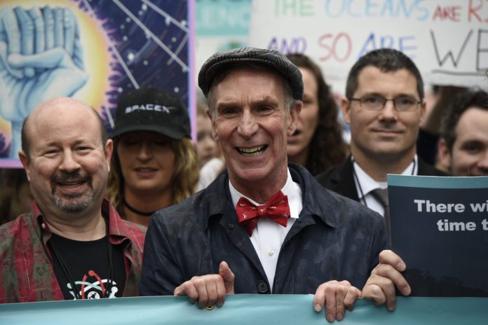 Bill Nye "The Science Guy" participates in the March for Science in Washington, Saturday, April 22, 2017. Scientists, students and research advocates rallied from the Brandenburg Gate to the Washington Monument on Earth Day, conveying a global message of scientific freedom without political interference and spending necessary to make future breakthroughs possible. (AP Photo/Sait Serkan Gurbuz)