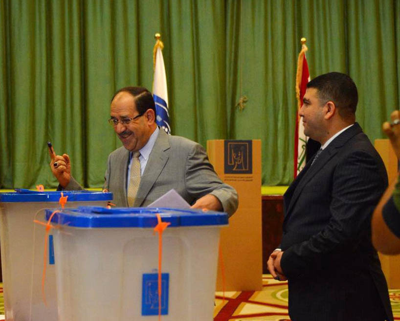 Iraqis vote in an election without foreign troops