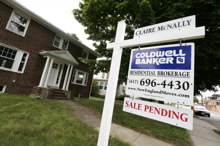 FILE - In this July 10, 2014, file photo, a sale pending sign is posted in front of a home for sale in Quincy, Mass. The National Association of Realtors releases its August report on pending home sales, which are seen as a barometer of future purchases, on Monday, Sept. 29, 2014. (AP Photo/Michael Dwyer, File)