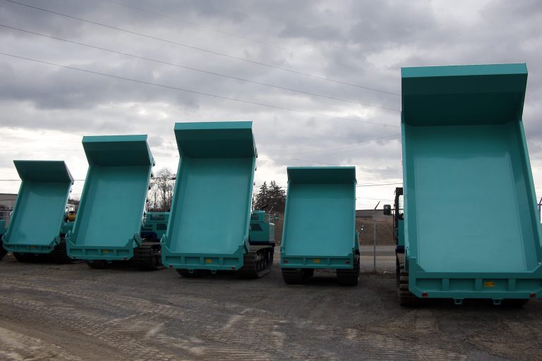In this photo made on Friday, March 28, 2014, earth moving and construction equipment is stored on a lot at the Highway Equipment Company in Zelienople, Pa. The Commerce Department reports on business orders for durable goods in April on Tuesday, May 27, 2014. (AP Photo/Keith Srakocic)