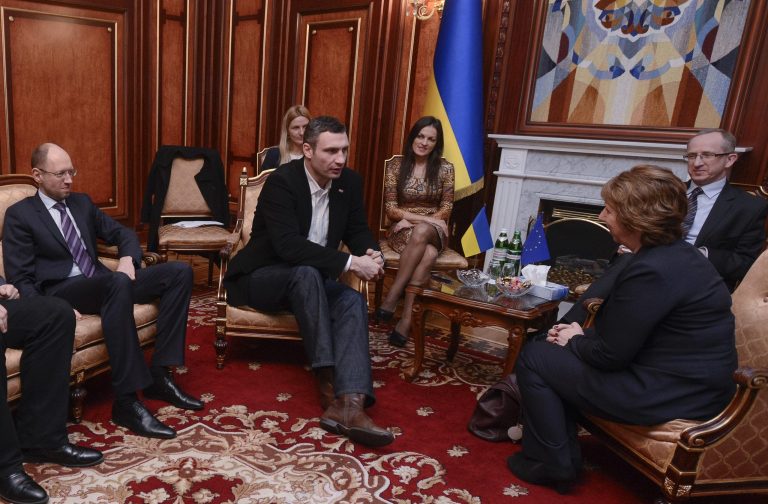 Ukrainian opposition leader Arseniy Yatsenyuk, left, and Ukrainian lawmaker and chairman of the Ukrainian opposition party Udar (Punch), former WBC heavyweight boxing champion Vitali Klitschko, foreground center, during their talks with EU foreign policy chief Catherine Ashton, foreground right, during their talks in Kiev, Ukraine, Monday, Feb. 24, 2014.The head of the European security organization, OSCE is proposing the establishment of an international contact group to support Ukraine in its difficult transition period.(AP Photo/Andrew Kravchenko, Pool)