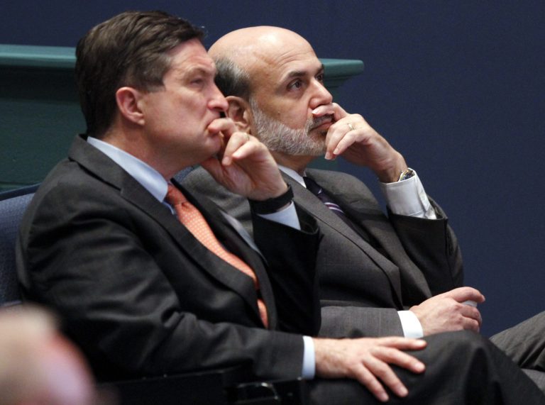   FILE - In this June 9, 2010, file photo, Federal Reserve Chairman, Ben Bernanke, right, listens with president of the Federal Reserve of Richmond, Jeffrey Lacker, left, at J. Sergeant Reynolds Community College in Richmond, Va. With an eye on the âfiscal cliff,â the Federal Reserve is expected to announce a new bond-buying plan to support the U.S. economy on Tuesday, Dec. 11, 2012. Lacker has said he thinks the job market is being slowed by factors beyond the Fed's control and he says further bond purchases risk worsening future inflation. (AP Photo/Steve Helber, File)  