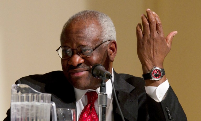 Clarence Thomas asked his question toward the end of a hearing on domestic abuse during Monday morning's first session in the case Voisine v. United States. (AP Photo)