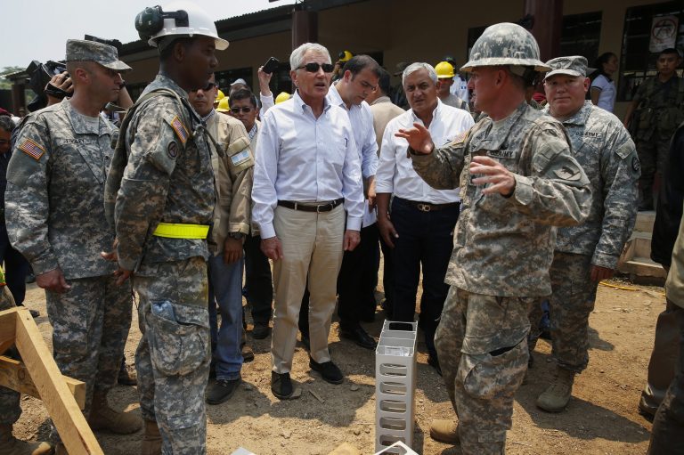 Defense Secretary Chuck Hagel and Guatemalan President Otto Perez Molina visit the Beyond the Horizons site in Los Limones, Guatemala, Friday, April 25, 2014.    (AP Photo/Shannon Stapleton, Pool)