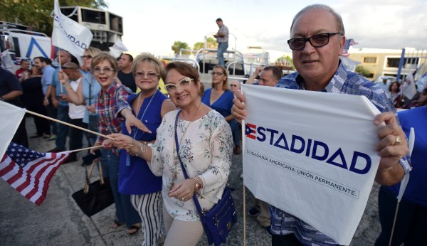 Puerto Rico demands statehood, introduces shadow lawmakers to Congress