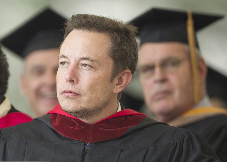   SpaceX CEO and Chief Designer Elon Musk pauses during his commencement speech for Caltech graduates in Pasadena, Calif. Friday, June 15, 2012. (AP Photo/Damian Dovarganes)  
