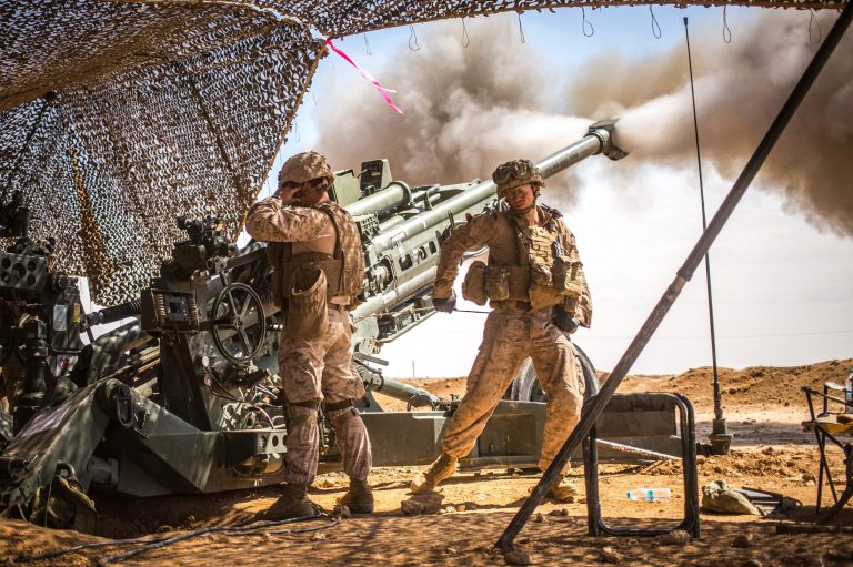 U.S. Marines with the 11th Marine Expeditionary Unit fire an M777 Howitzer in northern Syria.