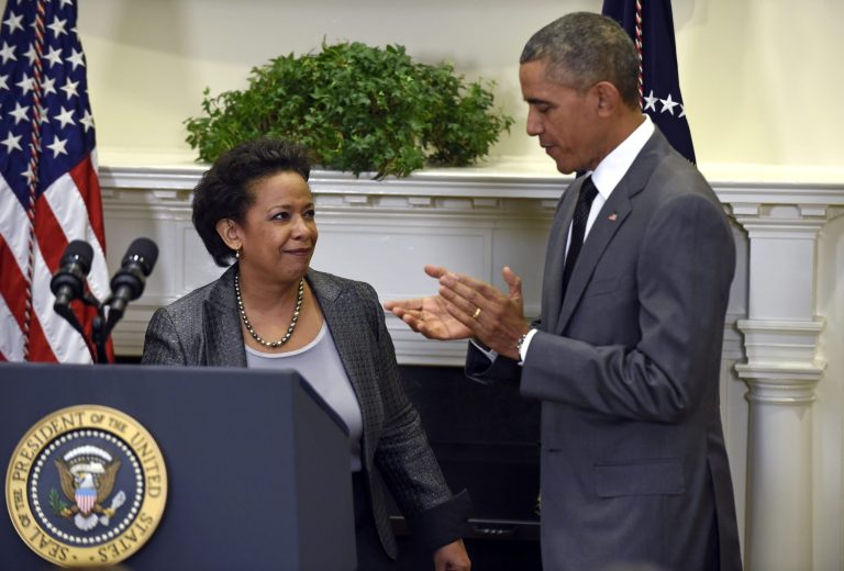 U.S. Attorney Loretta Lynch looks at President Obama after he nominated her to be the next attorney general, Saturday. Lynch would succeed Attorney General Eric Holder. (AP Photo/Susan Walsh)