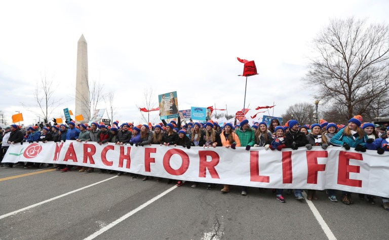 Abortion destroys a human life every time, whereas most refugees who aren't admitted into the U.S. will likely live. (AP Photo/Manuel Balce Ceneta)
