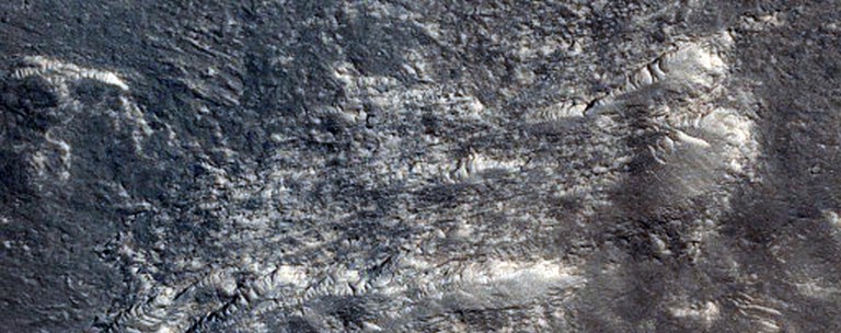 This image provided by NASA and taken by a camera aboard NASA's Mars Reconnaissance Orbiter shows the equatorial plains region known as Elysium Planitia on Mars. Using a radar instrument aboard the spacecraft, scientists made a 3-D map of flood channels below the surface of Mars, apparently created by past flooding. The findings were reported online Thursday, March 7, 2013 in the journal Science. (AP Photo/NASA)