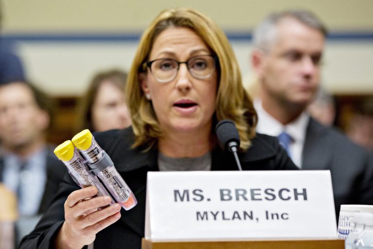 Heather Bresch, chief executive officer of Mylan NV, holds up Mylan EpiPen medication during a House Oversight and Government Reform Committee hearing on Sept. 21, 2016. Lawmakers questioned Bresch about why the company raised the price of the life-saving injection to $600 for a two-pack, from $57 a shot when it took over sales of the product in 2007. (Andrew Harrer/Bloomberg)