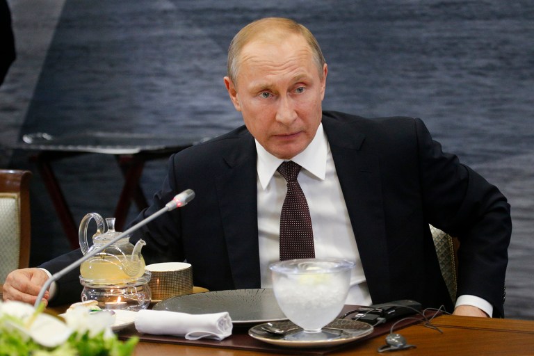 Russian President Vladimir Putin seemed to walk back comments this weekend in praise of Republican nominee Donald Trump. (AP Photo/Dmitry Lovetsky)