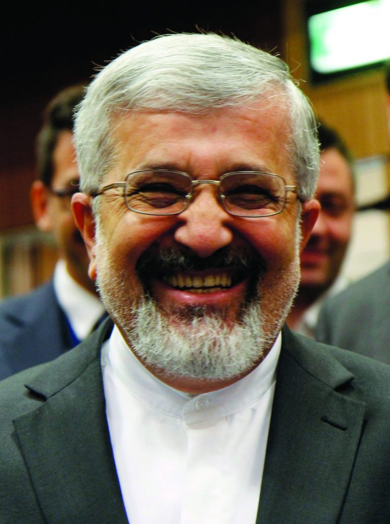 FILE - In this March 5, 2012 file photo Iran's Ambassador to the International Atomic Energy Agency, IAEA, Ali Asghar Soltanieh smiles as he arrives for the IAEA board of governors meeting at the International Center, in Vienna, Austria. The U.N. nuclear agency is forming a special Iran team, drawing together sleuths in weapons technology, intelligence analysis, radiation and other fields of expertise as it seeks to add teeth to a long-stalled probe of suspicions that Tehran worked secretly on atomic arms, diplomats tell The Associated Press in a series of interviews reaching into Thursday, Aug. 23, 2012. (AP Photo/Ronald Zak, File)