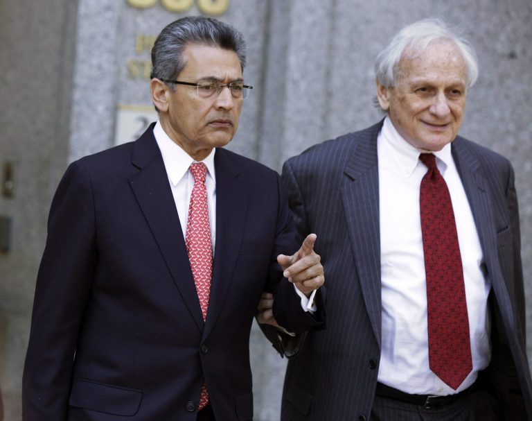   Former Goldman Sachs director Rajat Gupta, left, and his attorney Gary P. Naftalis, leave federal court in New York, Friday, June 15, 2012. Gupta, accused of feeding confidential information to a corrupt hedge fund manager, has been convicted of conspiracy and three counts of securities fraud. (AP Photo/Richard Drew)  