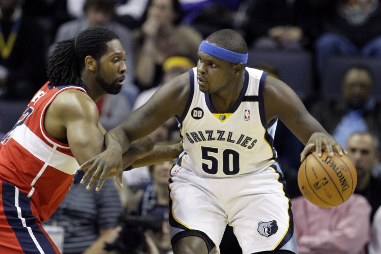 Danny Johnston/AP
Memphis forward Zach Randolph works the ball around Washington center Nene as the Grizzlies upended the Wizards 85-76 in Memphis on Friday.