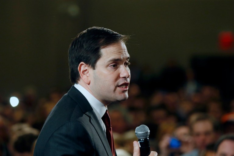 The new poll comes just a day after Rubio said he would win his state's GOP primary despite trailing Trump. (AP Photo/Jim Mone)