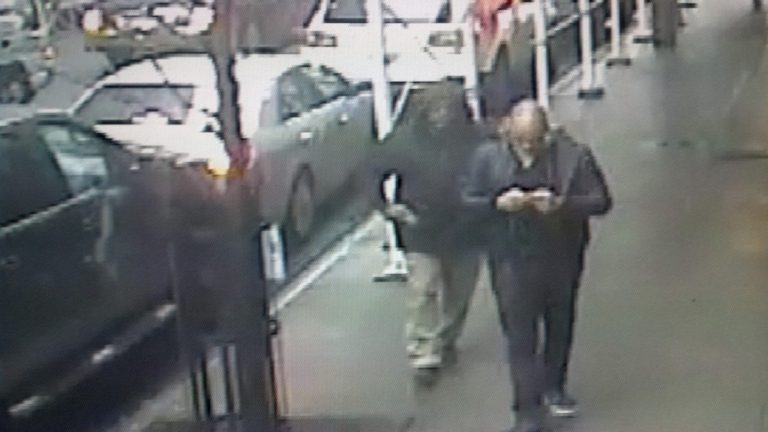   This still image made from a video provided by the New York City Police Department shows the gunman, left, behind Brandon Lincoln Woodard pulling the weapon from his jacket pocket a moment before the shooting, Mon. Dec. 10, 2012 in New York. A security camera photo shows a man pulling a weapon from his pocket moments before police say he shot a Los Angeles man in midtown Manhattan. The NYPD released the photo Tuesday amid a manhunt for the unidentified suspect in the execution-style slaying (Ap Photo/New York Police Department/ HO)  