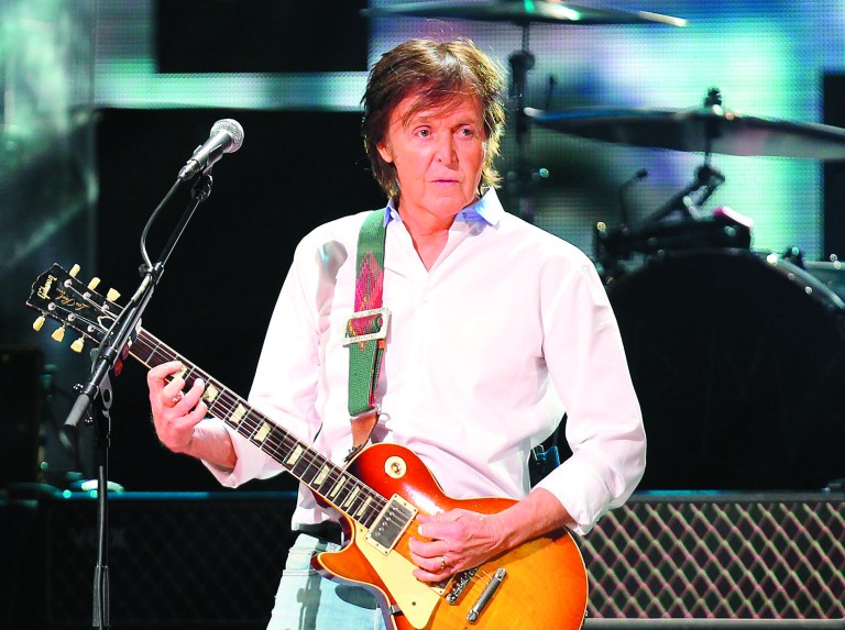 FILE - This Dec. 12, 2012 file image released by Starpix shows Paul McCartney at the 12-12-12 The Concert for Sandy Relief at Madison Square Garden in New York. McCartney and Mumford & Sons are among the headliners for the 2013 Bonnaroo Music & Arts Festival in Manchester, Tenn. The four-day festival, held on a rural 700-acre farm, will be held June 13-16, 2013. (AP Photo/Starpix, Dave Allocca, file)