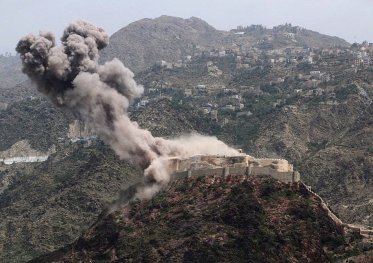 Smoke rises from al-Qahira castle, an ancient fortress that was recently taken over by Shiite rebels, following a Saudi-led airstrike in Taiz city, Yemen, Thursday, May 21, 2015. (AP Photo/Abdulnasser Alseddik)