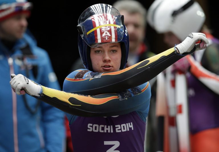 Kate Hansen of the United States warms up prior to starting her run during a training session for the women's singles luge at the 2014 Winter Olympics, Thursday, Feb. 6, 2014, in Krasnaya Polyana, Russia. (AP Photo/Michael Sohn)