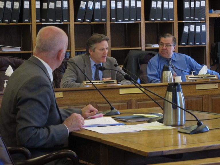 Sen. Mike Dunleavy, R-Wasilla, center, speaks during a conference on education, Tuesday, April 22, 2014, in Juneau, Alaska. Shown on the left is state Education Commissioner Mike Hanley. On the right is Sen. Lyman Hoffman, D-Bethel. (AP Photo/Becky Bohrer)