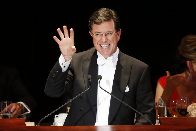 FILE - In this Oct. 13, 2013 file photo, Stephen Colbert delivers the keynote address during the Alfred E. Smith Memorial Foundation Dinner, a charity gala organized by the Archdiocese of New York, at the Waldorf-Astoria hotel in New York. Comedy Central deleted a message Thursday, March 27, 2014, from its 