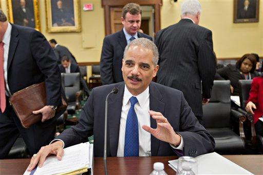 Obama splits the races over voter photo ID