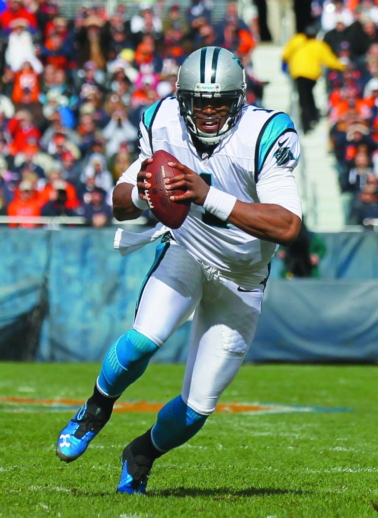 Charles Rex Arbogast/AP
Panthers quarterback Cam Newton has thrown for 1,701 yards,  five touchdowns and eight interceptions this season.