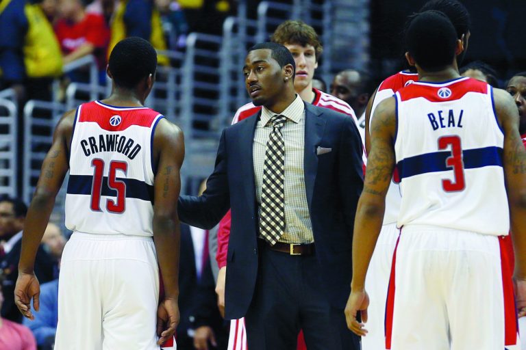 Rob Carr/Getty Images
Third-year point guard John Wall has missed the Wizards' first 33 games this season because of a stress injury in his knee.
