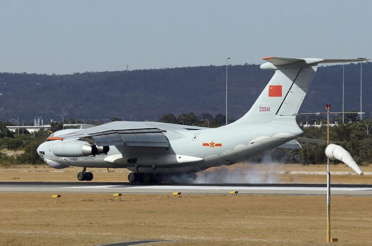 A Chinese Ilyushin IL-76 aircraft comes in for a landing at Perth International Airport after returning from the ongoing search operations for missing Malaysia Airlines Flight 370 in Perth,  Australia, Thursday, April 10, 2014. With hopes high that search crews are zeroing in on the missing Malaysian jetliner's crash site, ships and planes hunting for the aircraft intensified their efforts Thursday after equipment picked up sounds consistent with a plane's black box in the deep waters of the Indian Ocean.  (AP Photo/Rob Griffith)