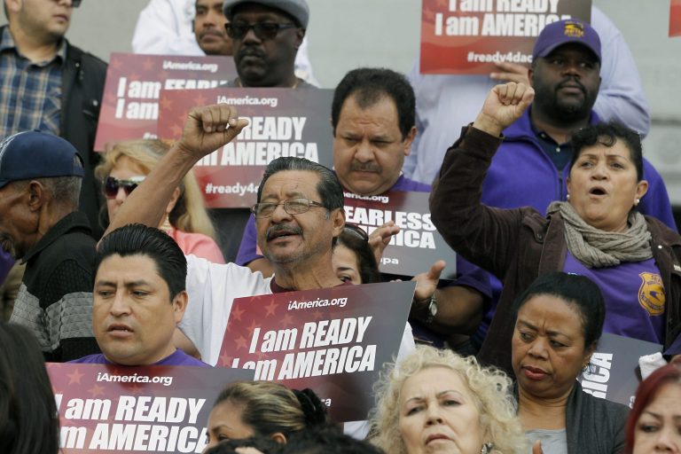 Community activists rally during an event on Deferred Action for Childhood Arrivals, DACA and Deferred Action of Parents of Americans,Â DAPA in downtown Los Angeles. (AP Photo/Nick Ut)