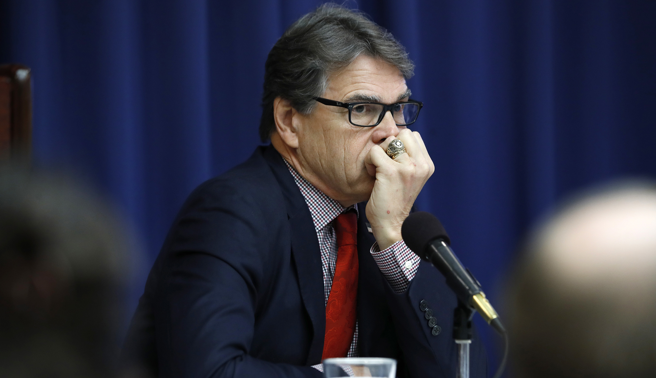 Rick Perry steps into pig manure prank