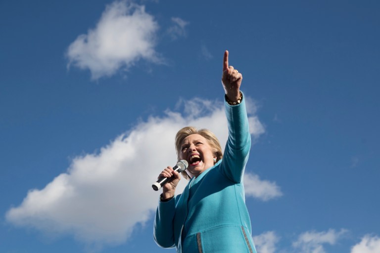 Democratic presidential candidate Hillary Clinton acknowledges members of the audience while speaking at a rally at St. Anselm College in Manchester, N.H., Monday, Oct. 24, 2016. (AP Photo/Andrew Harnik)