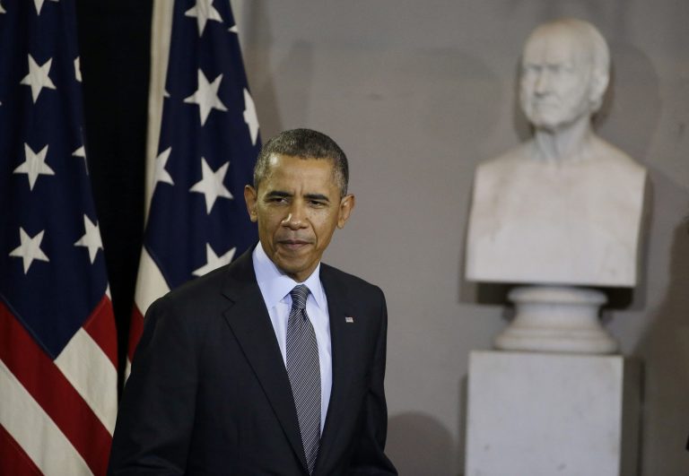 PresidentÃÂ ObamaÃÂ enters to speak atÃÂ Boston'sÃÂ historic Faneuil Hall about the federal health care law on Wednesday. (AP/Stephan Savoia)