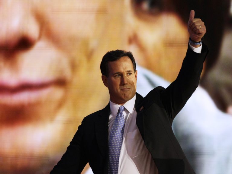 Former Pennsylvania Senator Rick Santorum gives a thumbs up to delegates after his speech. (AP Photo)