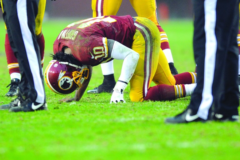 Nick Wass/AP
An MRI on Robert Griffin III's right knee revealed no serious damage after he was knocked out of the Redskins' victory over the Ravens.