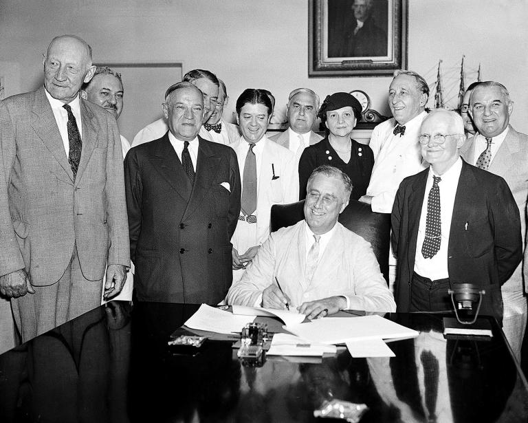 President Franklin D. Roosevelt signing the Social Security Bill in Washington. President Obama's economic advisers are calling on Congress to redirect funding from the Social Security retirement trust fund into the separate disability trust fund.Â (AP Photo, File)