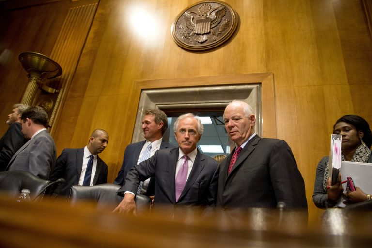 Senate Foreign Relations Committee Chairman Sen. Bob Corker, R-Tenn., center, speaks with ranking member Sen. Ben Cardin, D-Md., at a committee meeting to debate and vote on the Iran Nuclear Agreement Review Act of 2015. (AP Photo)