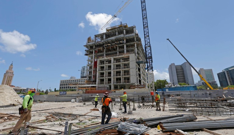 The Commerce Department issues the final estimate of how the U.S. economy performed in the second quarter. (AP Photo/Alan Diaz)