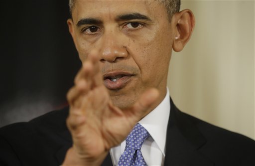 President Barack Obama gestures as he answers a question during a joint news conference with Afghan President Hamid Karzai in the East Room of the White House in Washington, Friday, Jan. 11, 2013. (AP Photo/Pablo Martinez Monsivais)